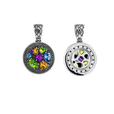 Yin Yang sterling silver pendant with peridot, citrine, blue topaz, and amethyst quartz in artisan design.
